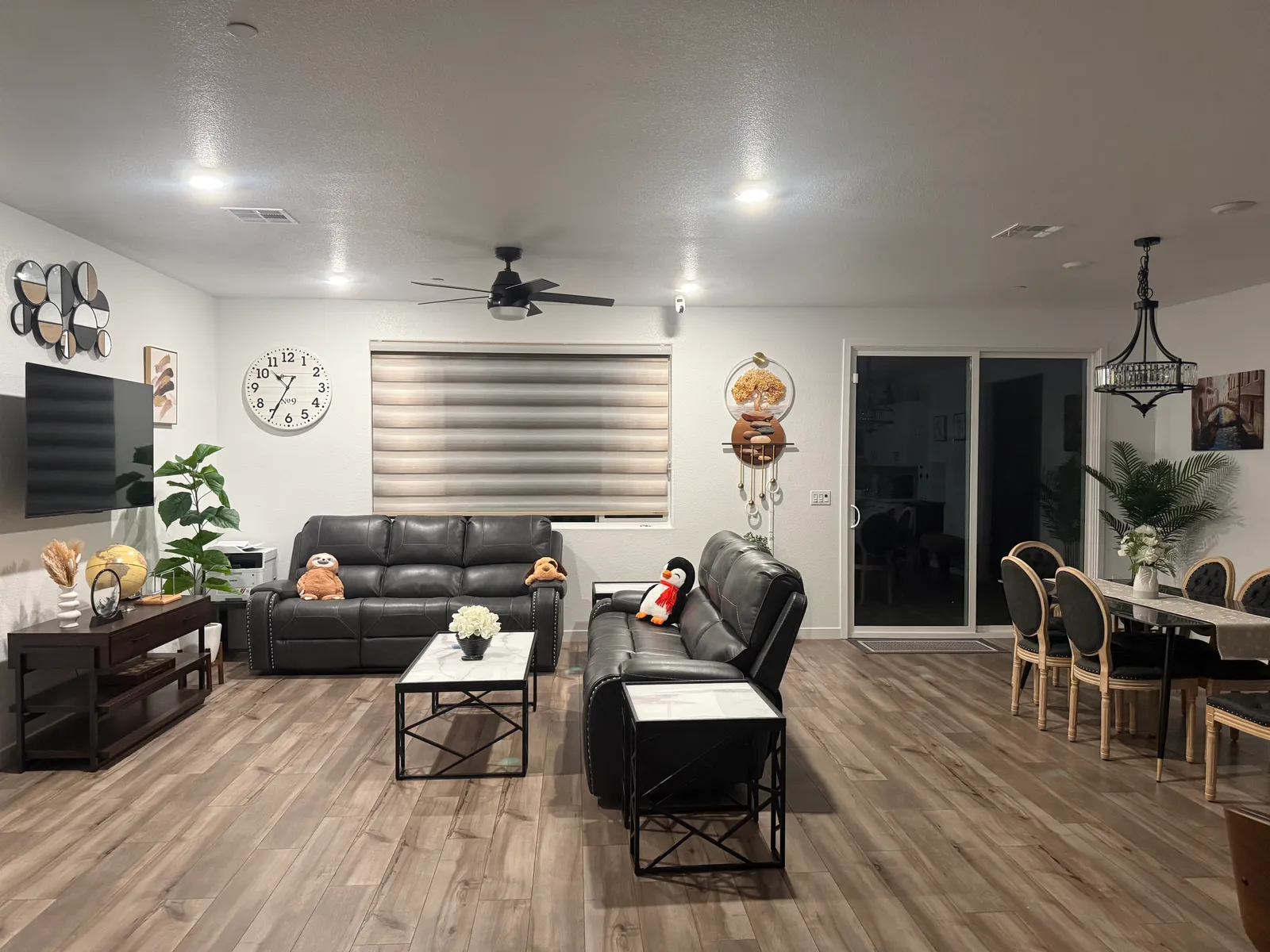 Bright open common living and dining area inside At Home Comfort Assisted Living
