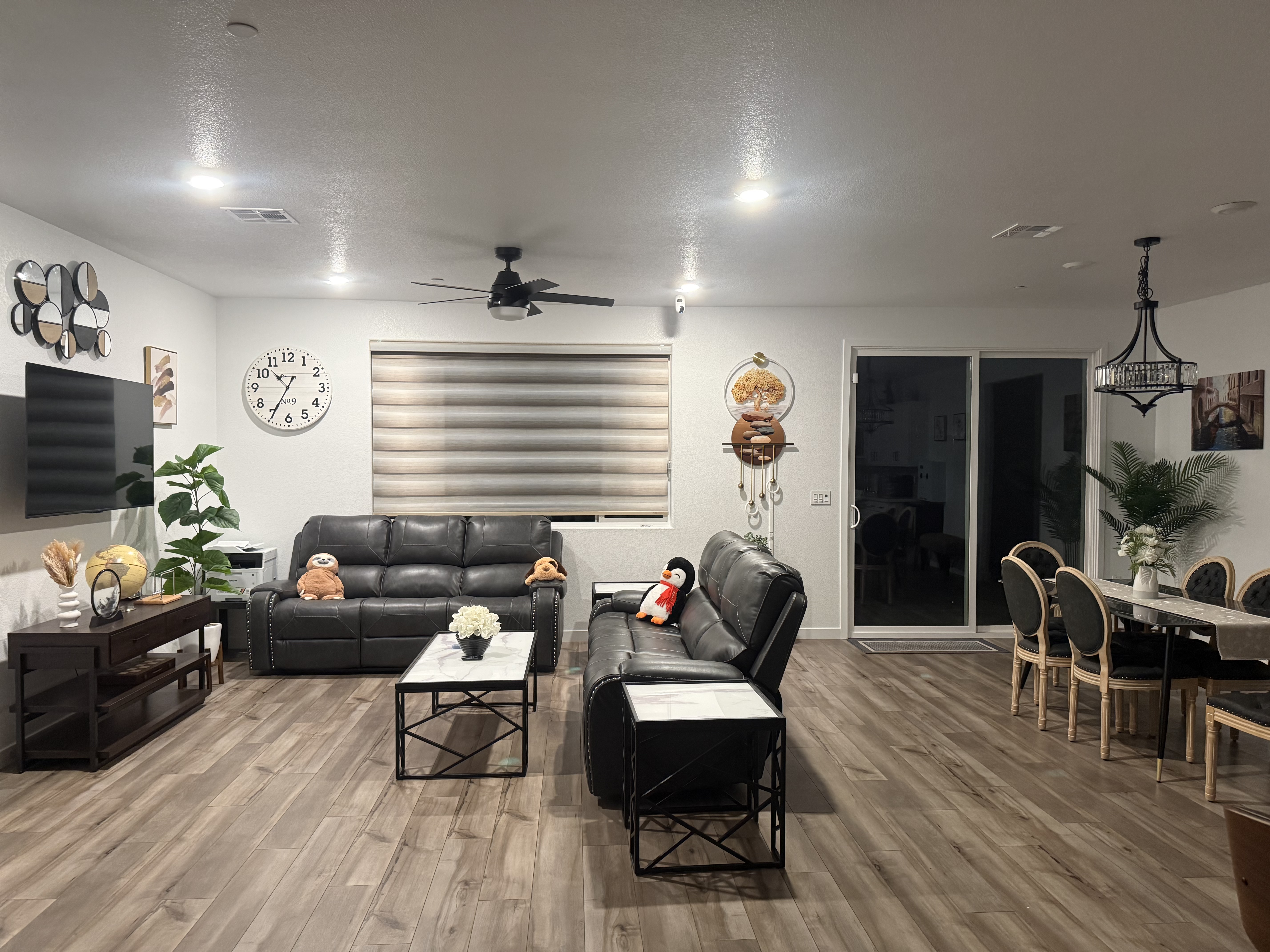 Bright open common living and dining area inside At Home Comfort Assisted Living